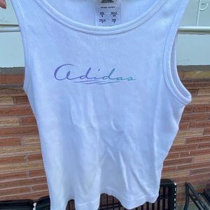White tank with purple/blue/green “adidas” sign